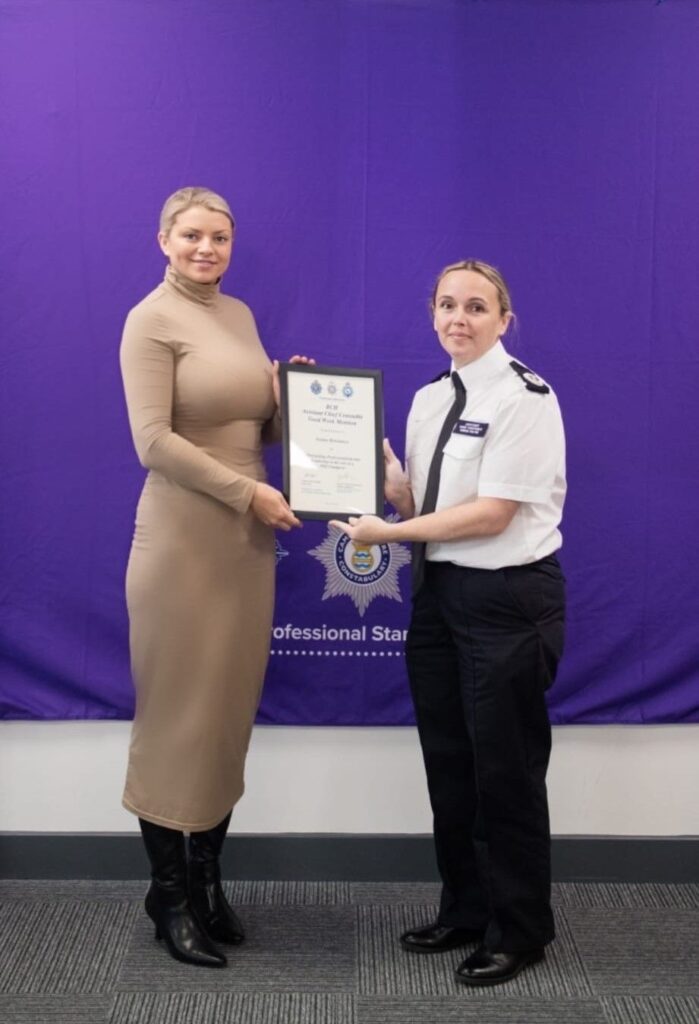 Joanne receiving her PSD Champion award from the Assistant Chief Constable