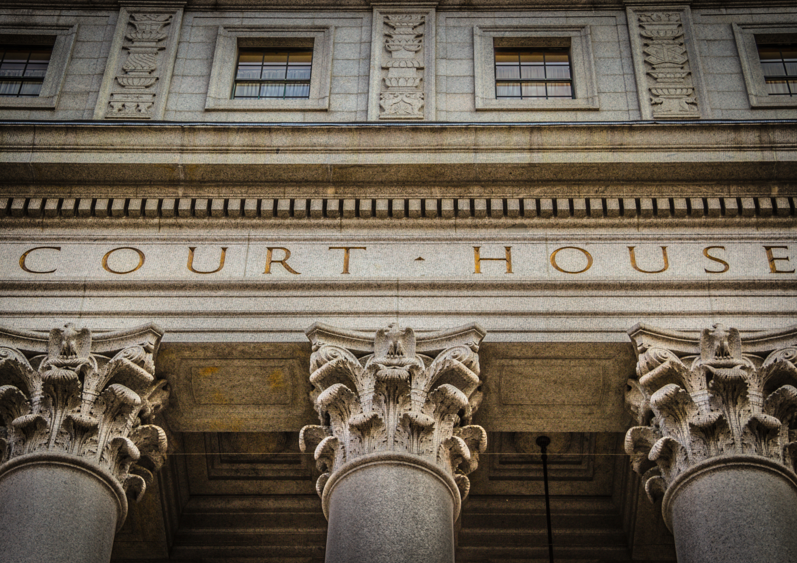 British court building illustrating criminal proceedings related to restraining orders in the UK